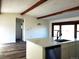 Bright kitchen featuring sleek countertops, white cabinets, and hardwood flooring at 609 S 1St Ave, Brighton, CO 80601