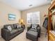 Living room showcasing plush seating and neutral decor, ideal for relaxation at 4084 S Crystal Cir # 104, Aurora, CO 80014
