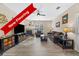 Inviting living room featuring new flooring, a fireplace, and neutral decor at 4084 S Crystal Cir # 104, Aurora, CO 80014