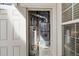 Utility closet containing a water heater and furnace, ensuring efficient home maintenance at 4084 S Crystal Cir # 104, Aurora, CO 80014
