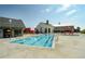 Enjoy this community pool area with a splash pad, water slides, and comfortable lounge seating at 10185 Xanadu St, Commerce City, CO 80022