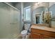 Bathroom featuring a walk-in shower and granite counter top on vanity at 20410 Brookmont Rd, Morrison, CO 80465