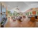 Spacious living room with large windows and a fireplace at 20410 Brookmont Rd, Morrison, CO 80465