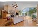 Inviting living room features a fireplace, hardwood flooring, and scenic views at 20410 Brookmont Rd, Morrison, CO 80465