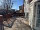 Back deck constructed of wood with built-in seating and back yard view at 1719 S Ensenada Way, Aurora, CO 80017