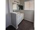 This bathroom features an oversized counter, neutral colors and ample lighting at 1719 S Ensenada Way, Aurora, CO 80017