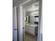 The bathroom features neutral colors, tile floors, generous counter space and good lighting at 1719 S Ensenada Way, Aurora, CO 80017