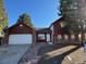 Charming two-story home featuring a spacious two-car garage and well-manicured front yard at 1719 S Ensenada Way, Aurora, CO 80017