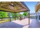 Expansive wooden back deck featuring a covered gazebo and overlooking the lawn and playground at 3525 Rinn Valley Dr, Longmont, CO 80504