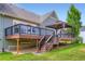 Multi-level back deck and stairs leading to a beautiful lawn area at 3525 Rinn Valley Dr, Longmont, CO 80504
