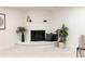 Cozy basement with a white-painted brick fireplace and stylish decor at 214 Iowa Dr, Golden, CO 80403