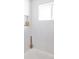 Bright bathroom features white subway tile, inset shelving, and a window for natural light at 214 Iowa Dr, Golden, CO 80403