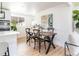 Dining area featuring stylish furniture and natural light at 214 Iowa Dr, Golden, CO 80403