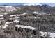 Aerial view of condo complex in snowy mountain setting at 246 Broken Lance Dr # 503, Breckenridge, CO 80424