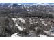 Aerial view of snowy neighborhood near mountains at 246 Broken Lance Dr # 503, Breckenridge, CO 80424