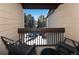 Private balcony offering mountain views and seating for two at 246 Broken Lance Dr # 503, Breckenridge, CO 80424