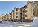 Building exterior with garage parking and snow at 246 Broken Lance Dr # 503, Breckenridge, CO 80424