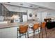 Kitchen boasts gray cabinets and breakfast bar at 246 Broken Lance Dr # 503, Breckenridge, CO 80424