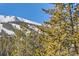 Scenic view of snow-capped mountain with ski slopes at 246 Broken Lance Dr # 503, Breckenridge, CO 80424