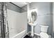 The bathroom features a tub, sink and toilet at 474 Black Feather Loop # 406, Castle Rock, CO 80104