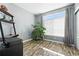 Bedroom with modern window and wood floors at 474 Black Feather Loop # 406, Castle Rock, CO 80104