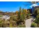 Serene landscape with walking paths, lush greenery, and colorful foliage, perfect for relaxation at 474 Black Feather Loop # 406, Castle Rock, CO 80104