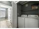 Practical laundry area with washer, dryer, and nearby access to the backyard at 474 Black Feather Loop # 406, Castle Rock, CO 80104