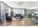 Comfortable living room featuring hardwood floors and a large window, creating an inviting space for relaxation at 474 Black Feather Loop # 406, Castle Rock, CO 80104