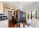 The kitchen is conveniently positioned to overlook a bright, open-concept living space with balcony access at 1035 Colorado Blvd # 405, Denver, CO 80206