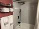 Bathroom with a tiled shower and a rack with towels at 13962 E Stanford Cir # L07, Aurora, CO 80015