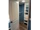 Walk in closet with organizers at 13962 E Stanford Cir # L07, Aurora, CO 80015