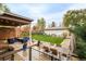 Expansive backyard featuring a patio, outdoor seating, and a lush lawn at 2658 Wolff St, Denver, CO 80212