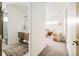 Primary suite bathroom featuring a modern vanity and access to the bedroom at 2658 Wolff St, Denver, CO 80212