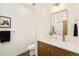 Modern bathroom with sleek vanity, contemporary mirror, and stylish fixtures at 2658 Wolff St, Denver, CO 80212