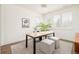 Bright home office features large windows, shutters, and a modern desk at 2658 Wolff St, Denver, CO 80212