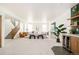 Spacious living room with stylish furnishings, and a wet bar with a wine refrigerator at 2658 Wolff St, Denver, CO 80212