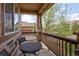 Charming front porch features stone columns and a comfortable seating area at 3472 Harvard Pl, Broomfield, CO 80023