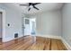 Bedroom featuring hardwood floors and neutral walls at 2 N Pennsylvania St, Denver, CO 80203