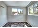 Room with tiled floor and lots of natural light from two windows at 2 N Pennsylvania St, Denver, CO 80203