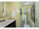 Bathroom with updated fixtures, neutral colors, and efficient layout, providing a functional space at 1235 S Zenobia St, Denver, CO 80219