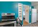 This kitchen offers stainless appliances, ample storage, and stylish serving cart at 1235 S Zenobia St, Denver, CO 80219