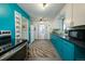 Bright, functional kitchen featuring modern appliances, ample storage, and neutral accents at 1235 S Zenobia St, Denver, CO 80219