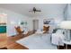 Bright living room features hardwood floors, modern decor, and stylish furniture at 1235 S Zenobia St, Denver, CO 80219