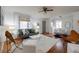 Bright living room featuring a comfortable seating area, hardwood floors, and stylish decor at 1235 S Zenobia St, Denver, CO 80219