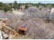 Aerial view of home and backyard gazebo with wooden deck in a wooded neighborhood at 8150 Tempest Ridge Way, Parker, CO 80134