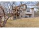 Charming home with multi-level wood decks, bay window and lush green lawn at 8150 Tempest Ridge Way, Parker, CO 80134