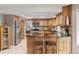 Well-appointed kitchen with granite countertops, stainless steel appliances, and an island with seating at 8150 Tempest Ridge Way, Parker, CO 80134