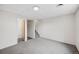 This bedroom has carpet, an entry door, and an entrance to the bathroom at 378 Owl Dr, Louisville, CO 80027
