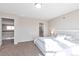 Serene bedroom with carpeted floors, offering a view of the en-suite bathroom at 12217 Skywalk St, Parker, CO 80134