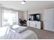 Bright bedroom featuring ample natural light and a dedicated workspace at 12217 Skywalk St, Parker, CO 80134